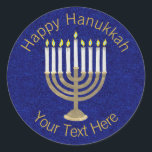 Hanukkah Gold Menorah On Rich Blue Background Classic Round Sticker<br><div class="desc">A classic Hanukiah design in gold and white on a deep blue faux sparkle background features space for your personalized text making this round sticker a unique addition to your Hanukkah celebrations. Use these Hanukkah stickers on mailings, scatter on a gift package or tuck them into favour bags as party...</div>