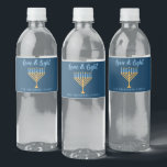 Hanukkah Love & Light Custom Blue Menorah Party Water Bottle Label<br><div class="desc">Cute custom Love and Light Hanukkah party water bottle labels for a Jewish family Chanukah dinner celebration with a synagogue. Personalize this pretty accessory with your own last name or group information in blue under the pretty gold menorah.</div>