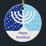 Hanukkah Menorah Ornament<br><div class="desc">The perfect ornament for the interfaith family. A Hanukkah menorah is silhouetted against a field of dark and light blue stars and snowflakes. Your personalized message goes below. Also can be used as  fan,  light or blind pulls or wall decor. Available with matching products.</div>