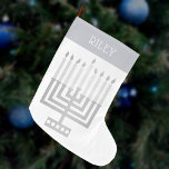 Hanukkah Menorah Silver Tone Elegant Modern Large Christmas Stocking<br><div class="desc">Personalize this elegant and modern style Hanukkah Menorah stocking by adding a name in white to the silver tone "cuff" design. The design is sleek and simple with my original square style Menorah in faux silver on white and a simple yet interesting font for the name. Whether you celebrate Chanuka...</div>