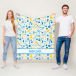Hanukkah Menorahs Personalized Fleece Blanket<br><div class="desc">This fabulous Hanukkah fleece blanket will add a festive, fun, celebratory feel your home! It has menorahs, Stars of David, gelt, and dreidels in blues and gold. Any child will love wrapping up in their own special blanket with their name to watch TV or be tucked into it in bed...</div>