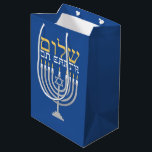 Hanukkah Shalom Peace on Earth Blue Medium Gift Bag<br><div class="desc">Hanukkah Shalom Peace on Earth Blue Gift Bag for all your holiday treats. Festive Hanukkah blue with a silver menorah and gold Shalom Peace On Earth. Easy to customize with text, fonts, and colours. Created by Zazzle pro designer BK Thompson exclusively for Kate’s Creations; please contact us if you need...</div>