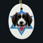 Hanukkah Star of David - English Springer Spaniel Ceramic Ornament<br><div class="desc">What could make saying Happy Hanukkah more fun than having this English Springer Spaniel Dog wearing a Yamaka surrounded by the Star of David. This whimsical holiday design will be sure to delight your friends and family as well as other dog lovers. This design is available in over 100 Dog...</div>