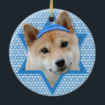 Hanukkah Star of David - Shiba Inu Ceramic Ornament<br><div class="desc">What could make saying Happy Hanukkah more fun than having this Shiba Inu Dog wearing a Yamaka surrounded by the Star of David. This whimsical holiday design will be sure to delight your friends and family as well as other animal lovers. This design is available in over 100 Dog Breeds....</div>