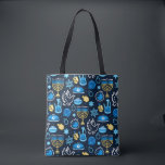 Hanukkah Symbols Blue Pattern Tote Bag<br><div class="desc">Celebrate the Festival of Lights with this Hanukkah-themed pattern. Featuring traditional symbols like menorahs,  dreidels,  doves,  and Stars of David,  all in vibrant blue,  gold,  and white hues,  this design is perfect for festive products. Ideal for Hanukkah wrapping paper,  greeting cards,  and other holiday decor.</div>