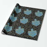 Hanukkah Wrapping Paper "Elegant Dreidels"<br><div class="desc">Hanukkah "Elegant Dreidels" Hope you like our new "Elegant Dreidels" gift wrap with blue and gold bling to pretty up your gifts:) Choose from 4 styles and 5 sizes of wrapping paper. The background colour can be changed by selecting a different colour from colour swatches. Enjoy and thanks for stopping...</div>