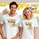 Happ-Bee Birthday Bee Pun Bumblebee and Beehive T-Shirt<br><div class="desc">Birthday t-shirts with personalized bee pun. Wording reads "happ-bee birthday [name]" and is decorated with bumblebee, beehive and wildflowers. Perfect for parents to wear at their little one's bee themed birthday party! For co-ordinating invitations and party decor, please browse my So Sweet to Bee Three Bee Birthday collection or message...</div>