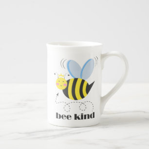 Happy bee princess with crown and slogan Bee Kind Bone China Mug