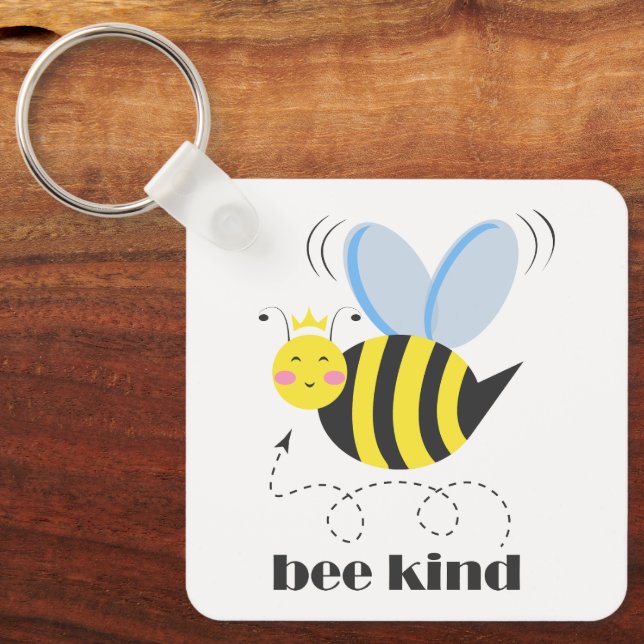Happy bee princess with crown and slogan Bee Kind Keychain (Front)