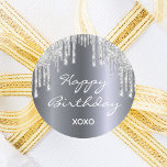 Happy Birthday glitter silver sparkle glam girly Classic Round Sticker<br><div class="desc">A trendy and glamourous birthday. A faux silver metal,  foil looking background decorated with faux silver glitter drips,  paint dripping look.  White coloured text:  Happy Birthday is written with a modern hand lettered style script. XOXO - hugs and kisses.  Perfect for gift wrapping or favours.</div>