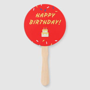Happy birthday on red hand fan