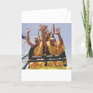 Happy buddhist monks on a roller coaster card