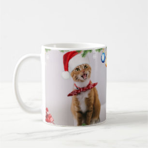 Happy cat in red christmas hat coffee mug