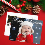 Happy Christmas Family Photo White Cursive Script Postcard<br><div class="desc">Elegant Happy Christmas photo postcard with beautiful cursive script in white. This modern holiday family photograph postcard features gorgeous typography and your name in white over the full bleed picture. Add a 2nd festive photograph to the back.</div>