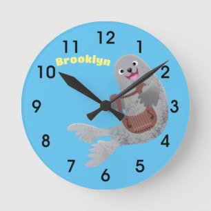Happy cute harp seal cartoon illustration round clock