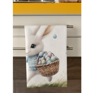 Happy easter, easter bunny walking with eggs   kitchen towel