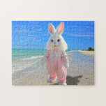 Happy Easter from Sanibel Island Florida Beach Jigsaw Puzzle<br><div class="desc">Happy Easter Florida Style! The design on this tropical-themed holiday jigsaw puzzle features an original photograph of a Sanibel Island Florida beach with its calm turquoise ocean, azure blue sky, and shell-laden sandy beach. (Photographed by Glenda Motsavage in painting mode.) A life-size Easter bunny decked out in pretty pastel pink...</div>