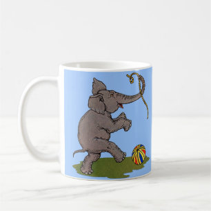 happy elephant playing with rope and ball coffee mug