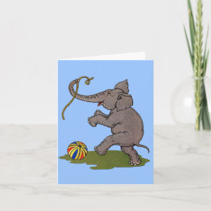 happy elephant playing with rope and ball note card