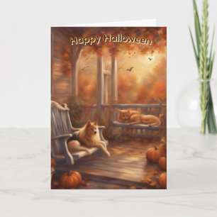 Happy Halloween cat and dog on a front porch Card