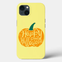 Happy Halloween lettering on carved pumpkin