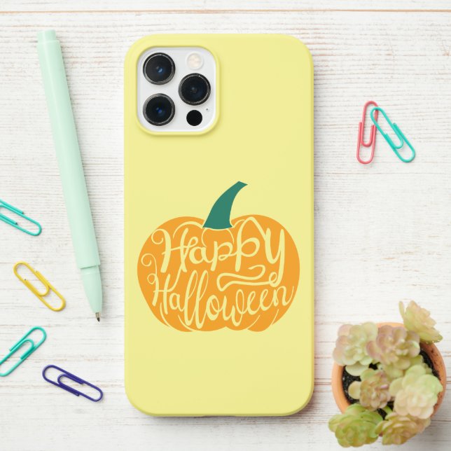 Happy Halloween lettering on carved pumpkin iPhone Case (On Desk)