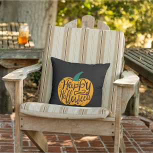 Happy Halloween lettering on carved pumpkin Outdoor Pillow