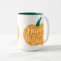 Happy Halloween lettering on carved pumpkin