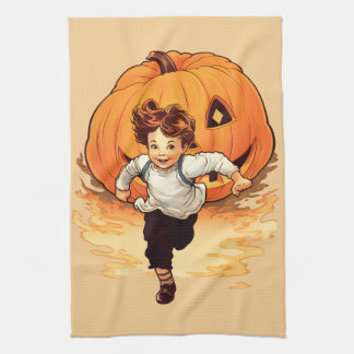 Happy Halloween Pumpkin Chasing Young Boy  Kitchen Towel