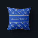 HAPPY | HANUKKAH BLESSINGS | Dreidel BLUE Throw Pillow<br><div class="desc">Mid blue THROW PILLOW to celebrate HANUKKAH. Blue and silver grey colour theme with all over DREIDEL print. There is customizable placeholder text on the front which says HANUKKAH BLESSINGS and on the back so you can personalize with your own greeting and/or name. Other versions available in the HANUKKAH Collection...</div>