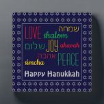 HAPPY HANUKKAH Love Joy Peace HEBREW Personalized Plaque<br><div class="desc">This is a colourful festive desktop plaque with faux silver Star of David in a subtle pattern against a deep blue background. The words LOVE JOY PEACE including their Hebrew translations are colour-coded in red, yellow and green. The text is customizable in case you wish to change anything. HAPPY HANUKKAH...</div>