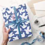 Happy Hanukkah Star of David Dove White Blue Wrapping Paper<br><div class="desc">Get ready to light up your Hanukkah celebrations with our Happy Hanukkah wrapping paper featuring snowflakes,  Star of David,  and Dove. This wrapping paper adds a special touch to your Hanukkah gifts. Wrap your love and warm wishes with this exquisite wrapping paper. Happy Hanukkah!</div>