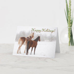 Happy Holidays card with two horses in snow