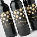 Happy Holidays Gold Christmas Ornaments Black Wine Label<br><div class="desc">Happy Holidays and your names accented by elegant gold and white Christmas tree ornaments on a black background. Personalize these wine bottle labels to give as gifts or to serve at your holiday dinner party,  corporate Christmas party,  holiday wedding engagement party and more. MATCHING items in our collection.</div>