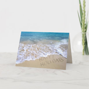 Happy Holidays sign on ocean beach Card