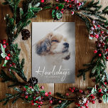 Happy Howlidays | Modern Dog Photo Red Christmas  Holiday Card<br><div class="desc">Simple, stylish custom photo Happiest Howlidays flat holiday greeting card with modern minimalist handwritten script typography in white and a simple gradient over a full photo with a red colour on the reverse. The photo of your beloved pet and text can easily be personalized for a design as unique as...</div>