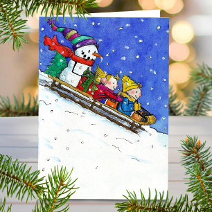 Happy kids sledging greeting card