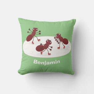 Happy red ants ice skating cartoon throw pillow