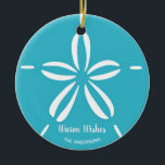 Happy Seashore | Tropical Beach Seashell Christmas Ceramic Ornament<br><div class="desc">Beach theme Christmas ornament features a tropical turquoise blue and white sand dollar seashell with a festive "Warm Wishes" holiday greeting. You can personalize both lines of text for a unique holiday gift or for your own tree. Perfect for beach lovers and tropical, nautical and coastal holiday decor themes. Original...</div>