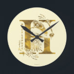 Harry Potter | Aguamenti HUFFLEPUFF™ Graphic Round Clock<br><div class="desc">Check out this Hufflepuff graphic based on the Aguamenti water-making spell. This features a yellow badger poking it's head through a giant letter "H" and the name "Hufflepuff" written below.</div>