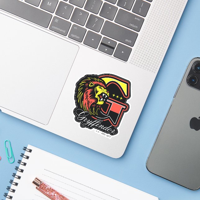HARRY POTTER™ | GRYFFINDOR™ Athletic Badge (Laptop w/ iPhone)