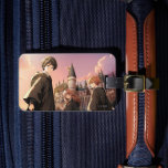 HARRY POTTER™ Hermione & Ron HOGWARTS™ Anime Scene Luggage Tag<br><div class="desc">Step into the wizarding world with this stunning illustration featuring Harry Potter™, Hermione Granger, and Ron Weasley standing before the majestic towers of Hogwarts™ at sunset. Bathed in warm golden light and soft twilight hues, the trio stands ready for whatever magical adventure awaits. With wands in hand and Hogwarts rising...</div>