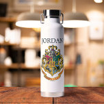 Harry Potter | Hogwarts Crest | Add Your Name Water Bottle<br><div class="desc">Ever dream of being in Gryffindor? Wish you could be in Ravenclaw? What about sorting into Slytherin or Hufflepuff? Even we everyday Muggles can be part of the magic of Harry Potter with this colorful crest design from Hogwarts. Inspired by the J.K. Rowling kids series, embrace the magic within and...</div>