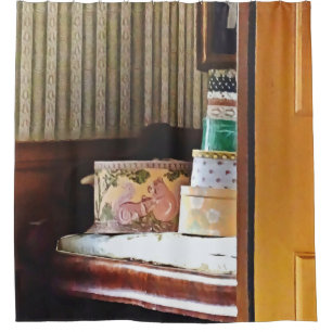 Hatboxes Seen Through an Open Door