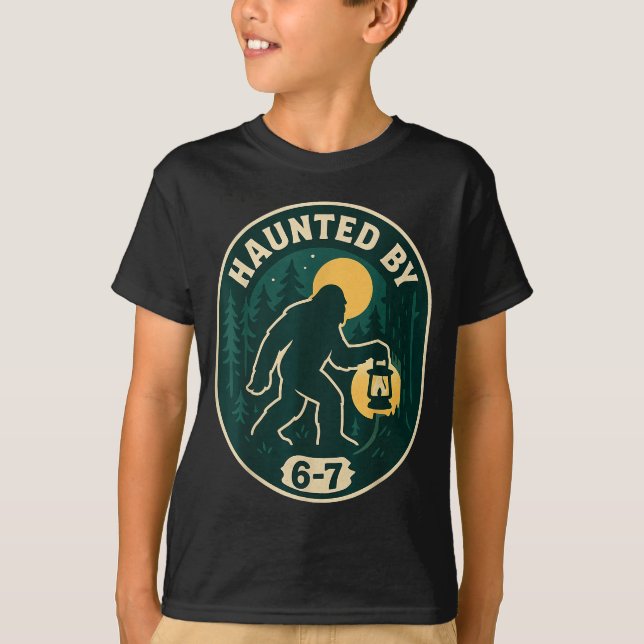 Haunted By 6-7 Bigfoot Lantern Halloween Badge  T-Shirt (Front)
