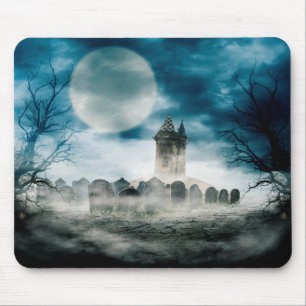 Haunted house on scary graveyard. Halloween scene. Mouse Pad