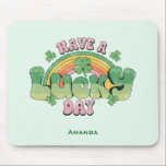 Have a Lucky Day Retro Typography Mouse Pad<br><div class="desc">Mousepad with a St. Patrick's Day themed image. A retro grunge style design which says: Have a lucky day. With a colourful rainbow behind. Words written in a fat rounded retro style vibe. Pink and green colours.</div>