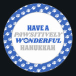 Have a Pawsitively Wonderful Hanukkah Classic Round Sticker<br><div class="desc">Introducing our delightful Hanukkah design featuring a charming border of white paw prints on a blue background. Embrace the festive spirit of Hanukkah with this design, which encloses a clean white background showcasing the heartfelt text "Have a pawsitively wonderful Hanukkah." The text is presented in blue and silver colours, with...</div>