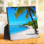 Hawaii Palm Tree Tropical Beach On Beach Time Plaque<br><div class="desc">“On beach time.” Rewind back to memories of lazy, tropical beach days whenever you gaze at this inspirational Hawaii vacation tabletop plaque of a lone palm tree on a sandy, crescent beach, with clear turquoise blue skies and water. Great for any room in your house! You can easily personalize this...</div>