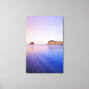 Haystack Rock At Dawn Blurred Blue Purple Waves Canvas Print